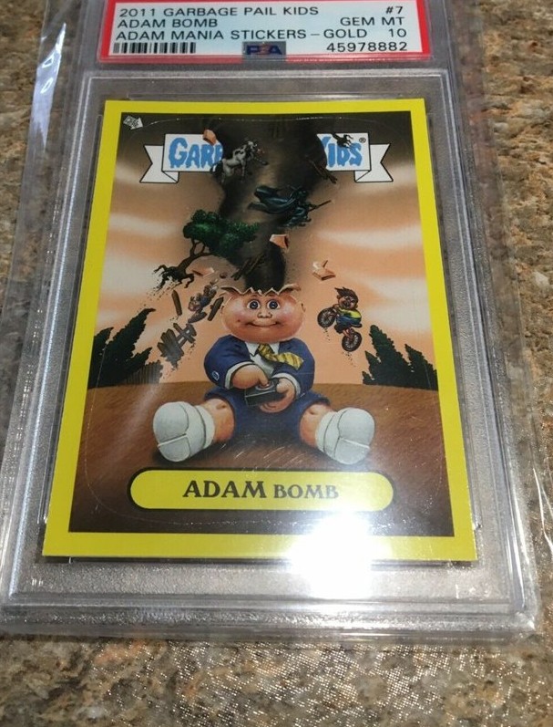 2011 Topps Garbage Pail Kids Flashback Adam Mania Stickers Gold #7 Adam Bomb front