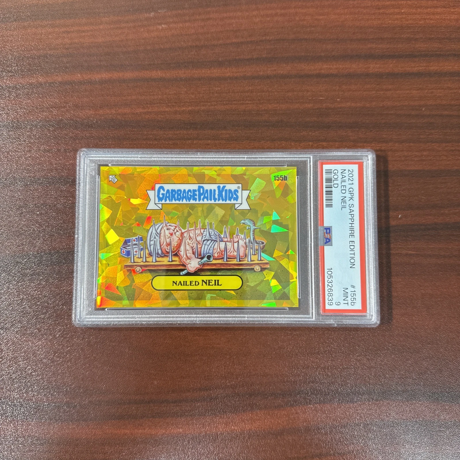 2021 Topps Garbage Pail Kids Sapphire Edition Gold #155b Nailed Neil front